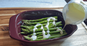 The cream sauce formula poured over freshly steamed asparagus