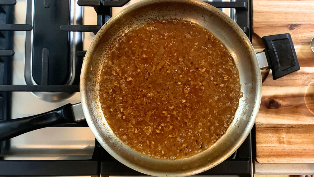 Wine and stock reducing in the pan