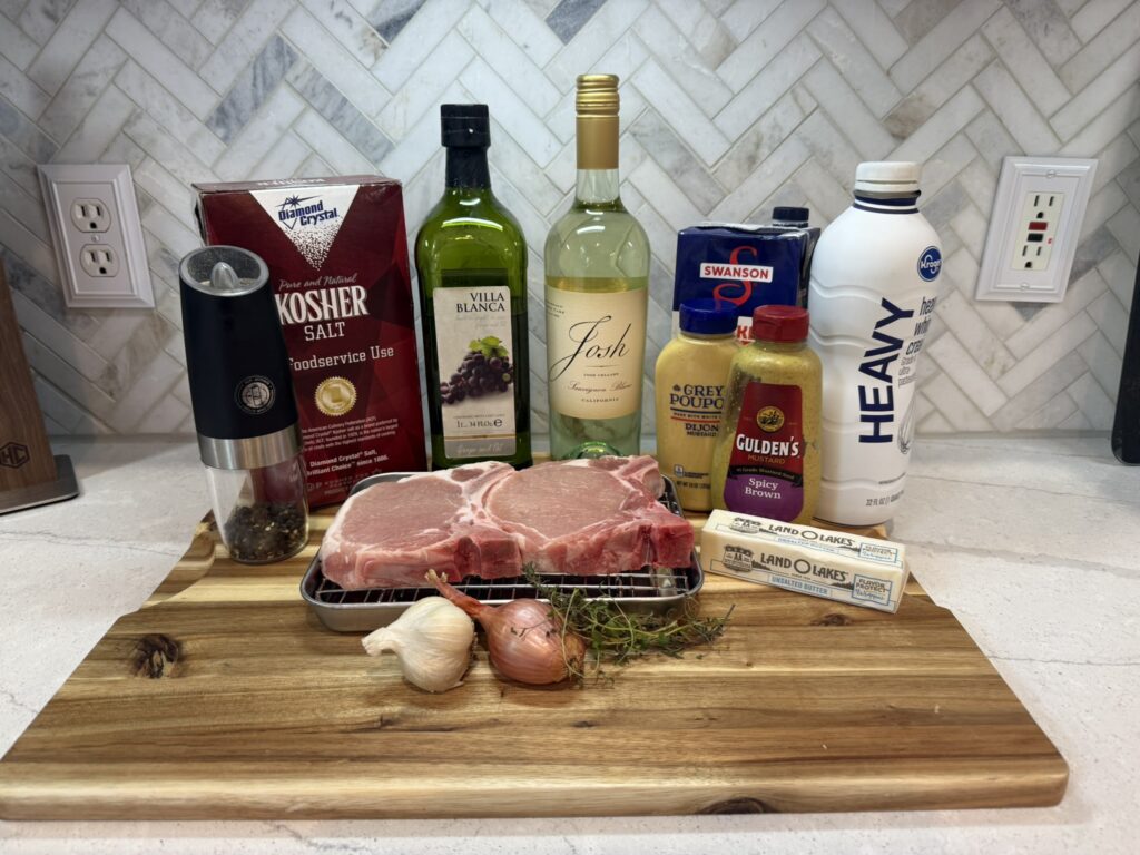 Ingredients for mustard cream pan sauce on a cutting board