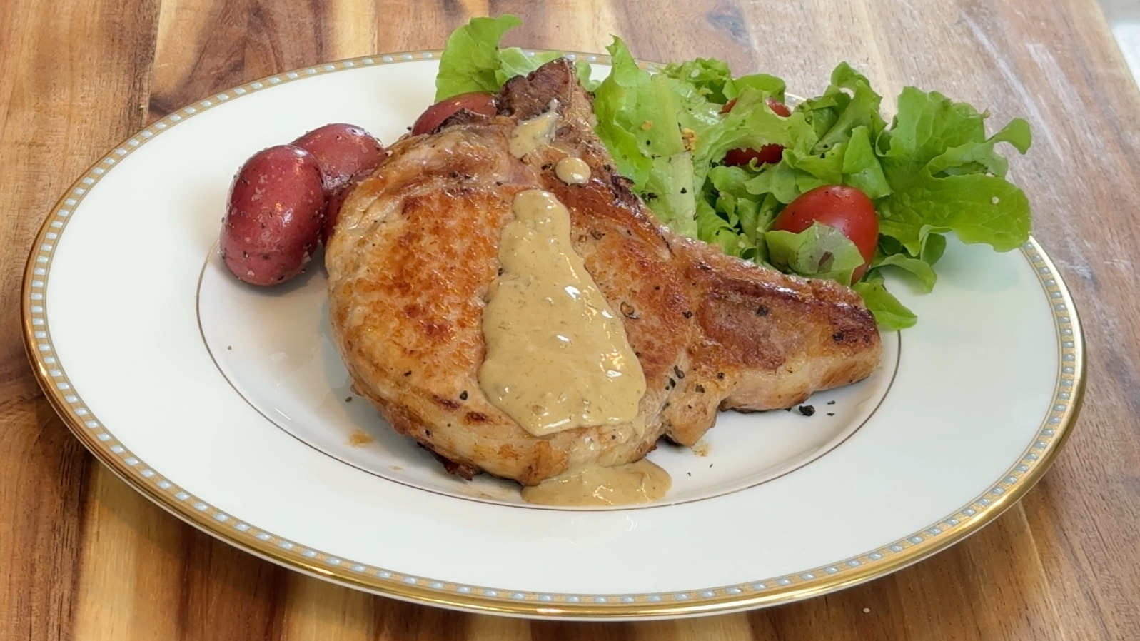 Pan seared pork chops with mustard cream sauce
