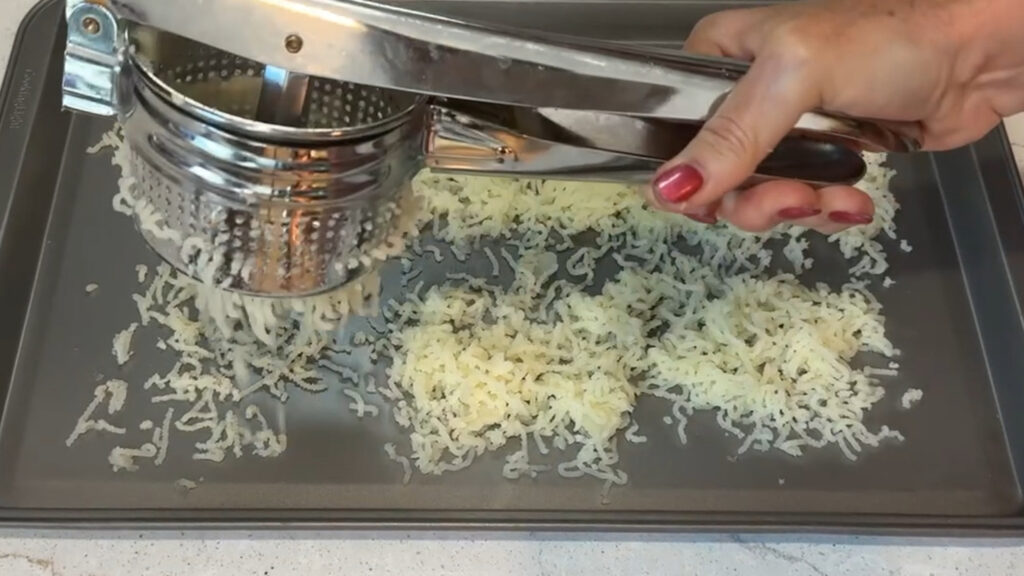 Image of a potato ricer.