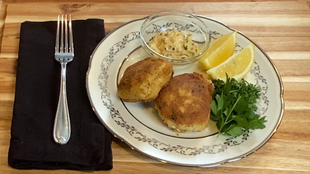 Crab cakes with Cajun-style dipping sauce